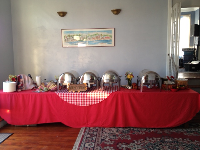 A buffet set for guests in the club room of Crescent Boat Club, a Boathouse Row event venue in Philadelphia
