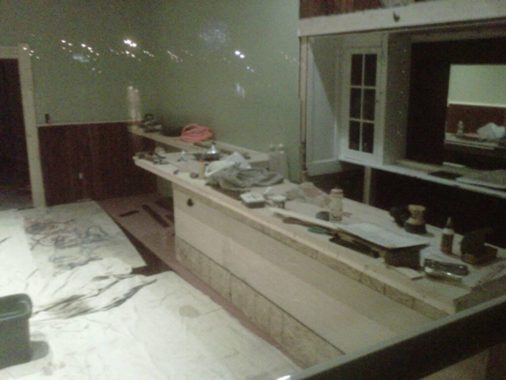 The bar at Crescent Boat Club under construction during the 2012 remodeling, framed out with its marble top waiting on the floor